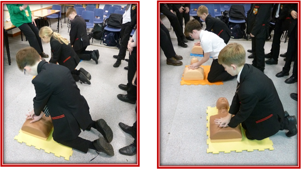 students undertaking CPR training