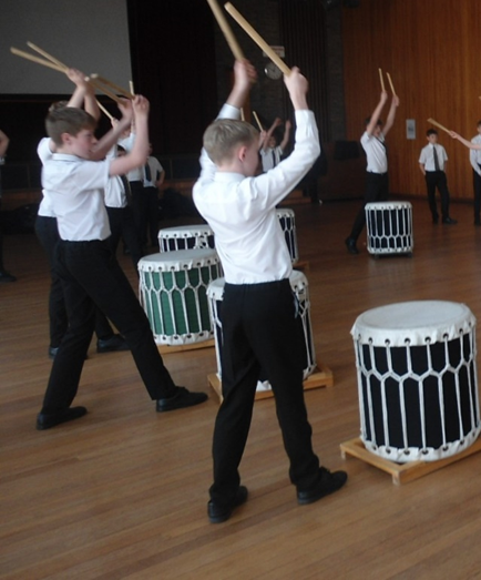 students drumming